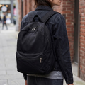 Solid Canvas Rounded Casual Backpack With Dual External Zip Compartments, Hidden Inner Security Pocket And Integrated Fabric Top Carry Loop