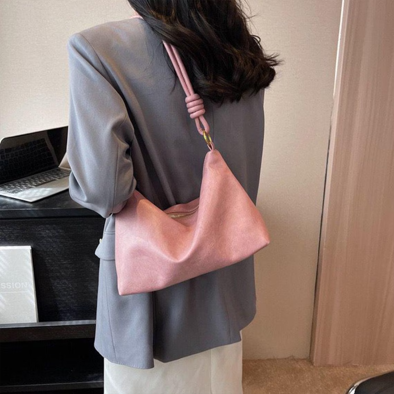 Blush Pink Soft Wrinkled Slouch Shoulder Bag With Coiled Knot Strap Detailing, Gold Metal Ring Fixtures And Full Curved Top Zipper Closure