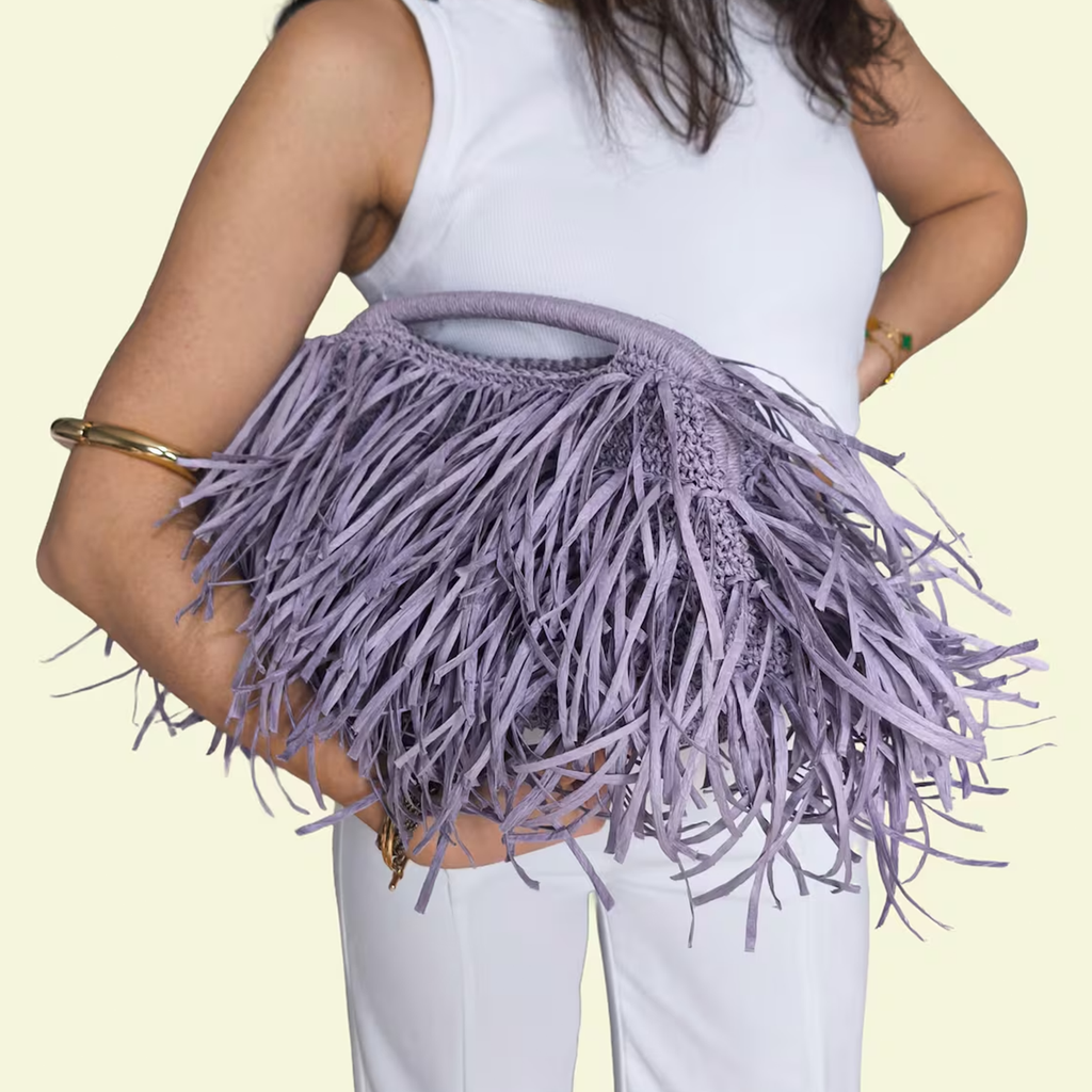 Soft Lavender Multi-Layer Fringe Handheld Clutch With Circular Woven Top Grip, Tight Interlaced Base Frame And Flowing Textured Outer Trim