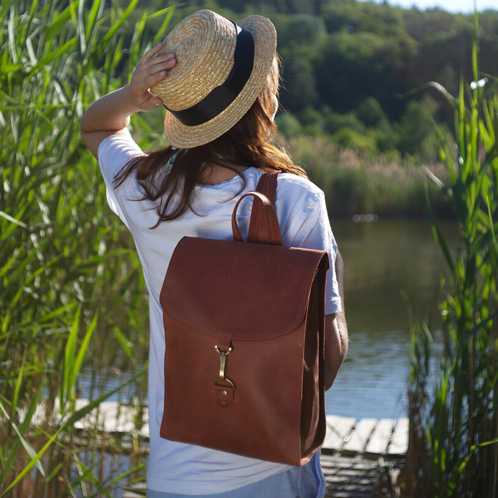 Vintage Rust Brown Vertical Fold Flap Rucksack With Antique Hook Ring Fastener, Curved Top Hand Loop, Side Access Zip Pocket And Adjustable Matching Shoulder Straps